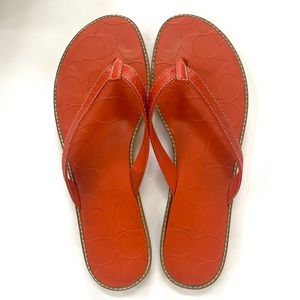 Coach Signature C Debbie Embossed Sandals Flip Flops Slip-ons in Orange